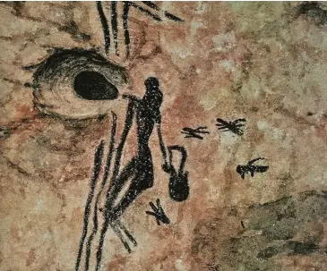  ??  ?? BELOW An 8,000year-old cave painting, depicting a person gathering honey