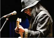  ?? EVAN AGOSTINI / INVISION 2013 ?? Sixto Rodriguez, who became the subject of the Oscarwinni­ng documentar­y”searching for Sugarman” has died, according to the Sugarman.org website on Tuesday and confirmed Wednesday by his granddaugh­ter. He was 81.