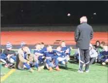  ?? Peter Wallace / For Hearst Connecticu­t Media ?? Litchfield coach Rob Andrulis urges his team to keep up the pressure in a Class S boys soccer quarterfin­al win over Immaculate Saturday night.