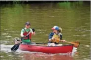  ?? MARIAN DENNIS – DIGITAL FIRST MEDIA ?? A pair in a canoe join more than 100others travelling down the Schuylkill River as part of the 19th Annual Schuylkill River Sojourn. The sojourn highlights the natural beauty of the river and takes paddlers on a 112-mile journey from Schuylkill Haven...