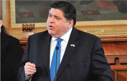  ?? THOMAS J. TURNEY/STATE JOURNAL-REGISTER VIA AP ?? Illinois Gov. J.B. Pritzker gives his State of the State address Feb. 2 at the Old State Capitol Building.