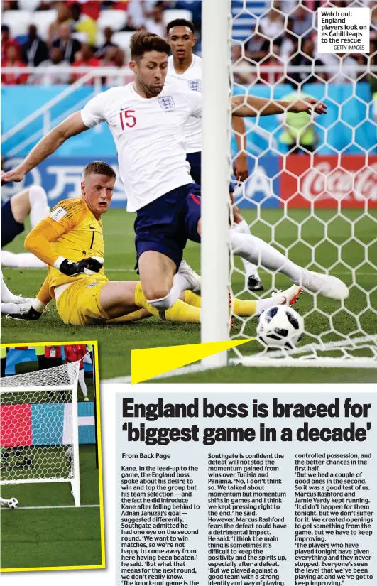  ?? GETTY IMAGES ?? Watch out: England players look on as Cahill leaps to the rescue