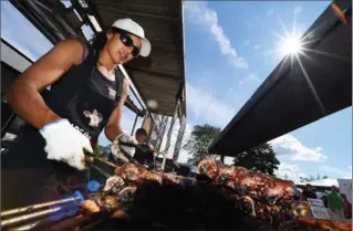 ?? HAMILTON SPECTATOR FILE PHOTO ?? The Oh, Canada! Ribfest is Friday from 3 to 11:30 p.m., Saturday from 11 a.m. to 11:30 p.m. and Sunday from 11 a.m. to 10:30 p.m. and Monday from 11 a.m. to 8 p.m., at Memorial Park on Hamilton Street in Waterdown.