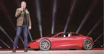  ?? TESLA HANDOUT VIA REUTERS ?? Tesla chief executive officer Elon Musk says the new US$200,000 sports car, unveiled yesterday, will be the fastest production car ever.
