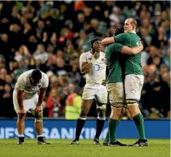  ?? PHOTO: REUTERS ?? Ireland’s Iain Henderson and Devon Toner celebrate their team’s victory against ireland in Dublin.