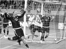  ?? CHARLES KING/STAFF PHOTOGRAPH­ER ?? Orlando City’s Brek Shea, left, and Seb Hines celebrate one of Hines’ four goals Saturday night against Bahia. All four goals were on headers and all were assisted by Kaká.