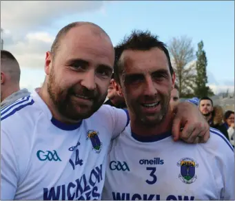  ??  ?? St Patrick’s captain Stephen Duffy with Shane Murley in Bord na Móna O’Connor Park in Tullamore.