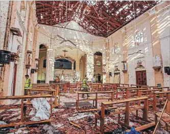  ?? CHAMILA KARUNARATH­NE THE ASSOCIATED PRESS ?? A view of St. Sebastian Catholic Church damaged in a blast in Negombo, a mostly Catholic town north of Colombo, Sri Lanka, on Sunday.