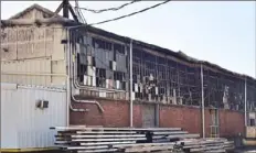  ?? Lucy Schaly/Post-Gazette ?? Two dozen fire companies battled a fire for over five hours at Sukup Steel Structures in Ambridge early Saturday.