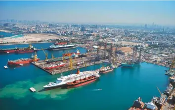  ?? Source: DP World ?? Above: Recently, Dubai Drydocks took on the main role at an existing shipyard in Montenegro, to oversee repair and related services for yachts.
Left: Dubai Drydocks signs the joint venture with Norway’s Aker Solutions.
