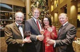  ?? Yi-Chin Lee photos / Houston Chronicle ?? David and Tara Wuthrich, center, chairs of Houston Symphony’s 2017 Wine Dinner and Collector’s Auction, Bob Weiner, left, and Jesse Tutor
