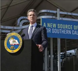 ?? HANS GUTKNECHT — STAFF PHOTOGRAPH­ER ?? Governor Gavin Newsom, speaking at a press conference in Carson on May 17, has warned local water authoritie­s that statewide conservati­on restrictio­ns could be mandated.