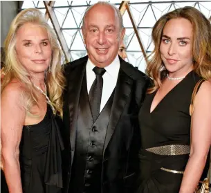  ??  ?? Mogul: Sir Philip Green with his wife Tina and daughter Chloe