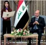  ?? AP ?? Nadia Murad speaks at a meeting with her country’s President Barham Salih in Baghdad on Wednesday. —