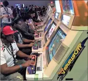  ?? / Sean Williams ?? Players used arcade cabinets in ‘Jebailey Land’ during the CEO event in Daytona Beach in late June.