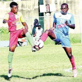  ?? FILE PHOTOS ?? Humble Lion’s Shamar Rhoden (left) goes into a 50-50 challenge with Portmore United’s Rondee Smith during a Red Stripe Premier League match at the Spanish Town Prison Oval on Sunday, January 5.