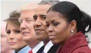 ?? JIMWATSON/ AFP/ GETTY IMAGES ?? BELOW: First lady Melania Trump, President Donald Trump, former President Barack Obama and former first lady Michelle Obama at the inaugurati­on.