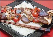  ?? TNS LINDA GASSENHEIM­ER/ ?? Chicken and Shiitake Yakitori (Japanese Grilled Chicken Skewers) can bemade in 20minutes.