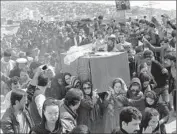  ?? Wakil Kohsar AFP/Getty Images ?? IN KABUL, Afghanista­n, women carry the casket of the 28-year-old woman killed by a mob at a shrine.