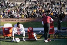  ?? The Associated Press ?? LOOK OF DESPAIR: Arkansas defensive lineman Dorian Gerald sits on the bench following Saturday’s 50-48 loss to Missouri in Columbia, Mo. Missouri won the game on a last-second field goal by Harrison Mevis.