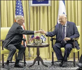  ?? DEBBIE HILL / POOL / VIA ASSOCIATED PRESS ?? U.S. Defense Secretary James Mattis (left) visits Friday with Israeli President Reuven Rivlin at the president’s residence in Jerusalem. Mattis is on a weeklong trip to the Middle East. The defense secretary also met with Prime Minister Benjamin...