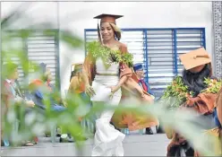  ?? Picture: RAMA ?? Graduate Jordana Ganilau, a Bachelor of Commerce in Tourism and Hospitalit­y Management degree recipient, during the USP graduation ceremony at the FMF Gymnasium yesterday.