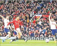  ?? AFP ?? Manchester United’s Portuguese striker Cristiano Ronaldo (second left) shoots to score their second goal during the English Premier League football match against Tottenham Hotspur.
