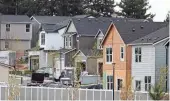  ?? MEEGAN M. REID/KITSAP SUN ?? Kitsap Landing off of Wheaton Way in Bremerton on April 2. The residentia­l developmen­t behind the Goodwill and Petco complex in Bremerton will eventually include 69 new single-family homes.