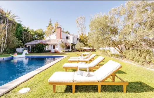  ?? AIRBNB PLUS ?? At this home in the Bel Air area of Los Angeles, the owner provided beach toys and towels for guests to enjoy the pool since amenities can help generate repeat business.