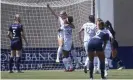  ?? Photograph: Rick Bowmer/AP ?? Portland Thorns’ Morgan Weaver, rear, celebrates with teammate Simone Charley (38) after scoring against the North Carolina Courage during the second half of Friday’s game.