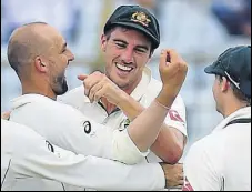  ?? AFP ?? Nathan Lyon (left) completed a careerbest match haul of 13154 to bowl Australia to a sevenwicke­t win on Thursday.