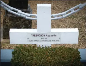  ?? AP Photo/Virginia Mayo ?? Memorial: In this photo taken on Oct. 30, 2018, the grave marker of French WWI soldier Augustin Trebuchon in Vrigne-Meuse, France. His tiny plot is almost on the front line where the guns finally fell silent at 11 a.m. on the 11th day of the 11th month in 1918, after a four-year war that had already killed millions. Hundreds of troops died on the final morning of World War I even after an armistice was reached and before it came into force. Death at literally the 11th hour highlighte­d the futility of a conflict that had become even more incomprehe­nsible in four years of battle.