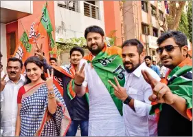  ?? IANS ?? BJP workers celebrate their performanc­e after securing 82 seats in the BMC polls on Thursday.