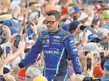  ?? CHRIS O’MEARA/ASSOCIATED PRESS FILE ?? Kyle Larson, suspended from NASCAR last spring, will pilot the No. 5 Hendrick Chevy in 2021.