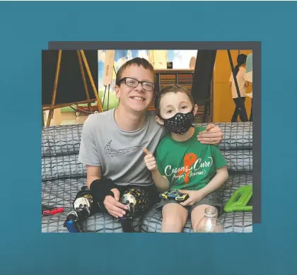  ??  ?? Cancer patients Zac Carter, left, and Carson Dimsdale have become best friends over their shared love of video games.