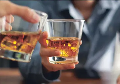  ?? GETTY ?? A large internatio­nal study found that people who down more than seven drinks a week can expect to die sooner than those who drink less.