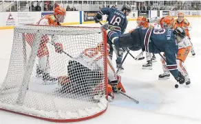  ??  ?? Dundee CCS Stars’ Kevin Bruijsten flies through the air in this attack on Sheffield Steelers’ goal. Kevin can again be a major player this weekend.