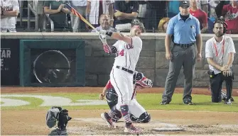  ?? THE ASSOCIATED PRESS ?? Washington Nationals Bryce Harper hits the winning home run during the Major League Baseball Home Run Derby on Monday in Washington, D.C. The 89th MLB All-Star Game will be played today.