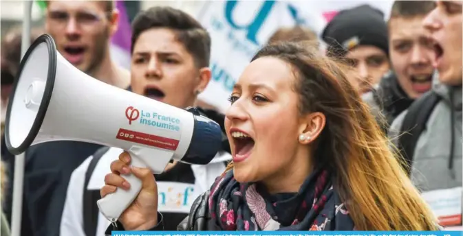  ?? — AFP ?? LILLE: Students demonstrat­e with striking SNCF (French National Railway Corporatio­n) employees near the Lille Flandres railway station yesterday in Lille, on the first day of a two-day strike.