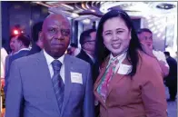  ?? ?? Republic of Angola Charge d' Affaires Nlando Augusto Bernardo with MB's Badette Cunanan