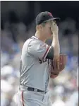  ??  ?? San Francisco pitcher Matt Cain of Memphis wipes his face during
Monday’s season- opener against the
Dodgers in Los Angeles.
Cain was outpitched by Clayton
Kershaw, who pitched a shutout and homered.
JAE C. HONG ASSOCIATED PRESS