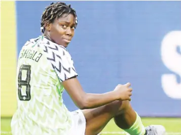  ??  ?? DOWN AND OUT: Super Falcons captain looks on during the match between Nigeria and the USA at the 2019 FIFA World Cup in France. The Falcons crashed out of the 2020 Olympic qualifiers after a 1-1 draw with Cote d'Ivoire in yesterday in Lagos