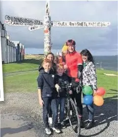  ??  ?? Welcome surprise Graeme’s wife Anna and children Rebekah, Judith, Ben, Samuel and Leah met him in John O’Groats at the end of his trek