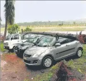  ?? ANI ?? Strong winds due to Cyclone Kyarr uprooted trees in Goa on Friday, damaging vehicles.