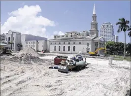  ?? LANNIS WATERS / THE PALM BEACH POST ?? First Baptist Church Pastor Kevin Mahoney said the lot south of the church is being cleared for a parking lot with a “beautiful landscape.”