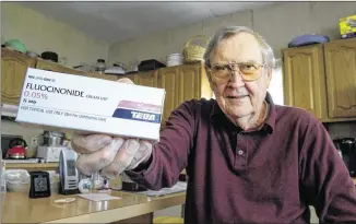  ?? CLEM MURRAY /PHILADELPH­IA INQUIRER ?? Casimir Janczewski, 74, shows the last prescripti­on of the generic cream Fluocinoni­de made by Teva that he bought. He stopped buying the generic product because the price went up almost $100. The dramatic price increases have caused insurers to charge...