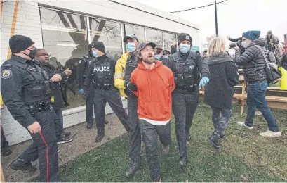  ?? RICK MADONIK TORONTO STAR ?? Adamson Barbecue owner Adam Skelly, 33, has been arrested and charged with one count of attempting to obstruct police, one charge of failing to leave when directed, one count of mischief and failure to comply with the Reopening Act.