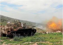  ?? PHOTO: GETTY IMAGES ?? A Turkish tank fires on Kurdish positions as the Turkish Armed Forces and Free Syrian Army carry out ‘‘Operation Olive Branch’’ in Syria.