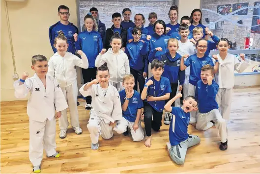  ?? ?? Team effort Vision Taekwondo youngsters who competed at the club’s home competitio­n