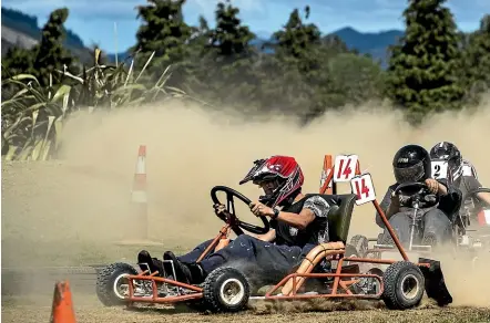  ?? BRADEN FASTIER/STUFF ?? Teams from around the South Island came together to race their self-built machines at the annual Top of the South Grass Kart Challenge at Tapawera Area School.